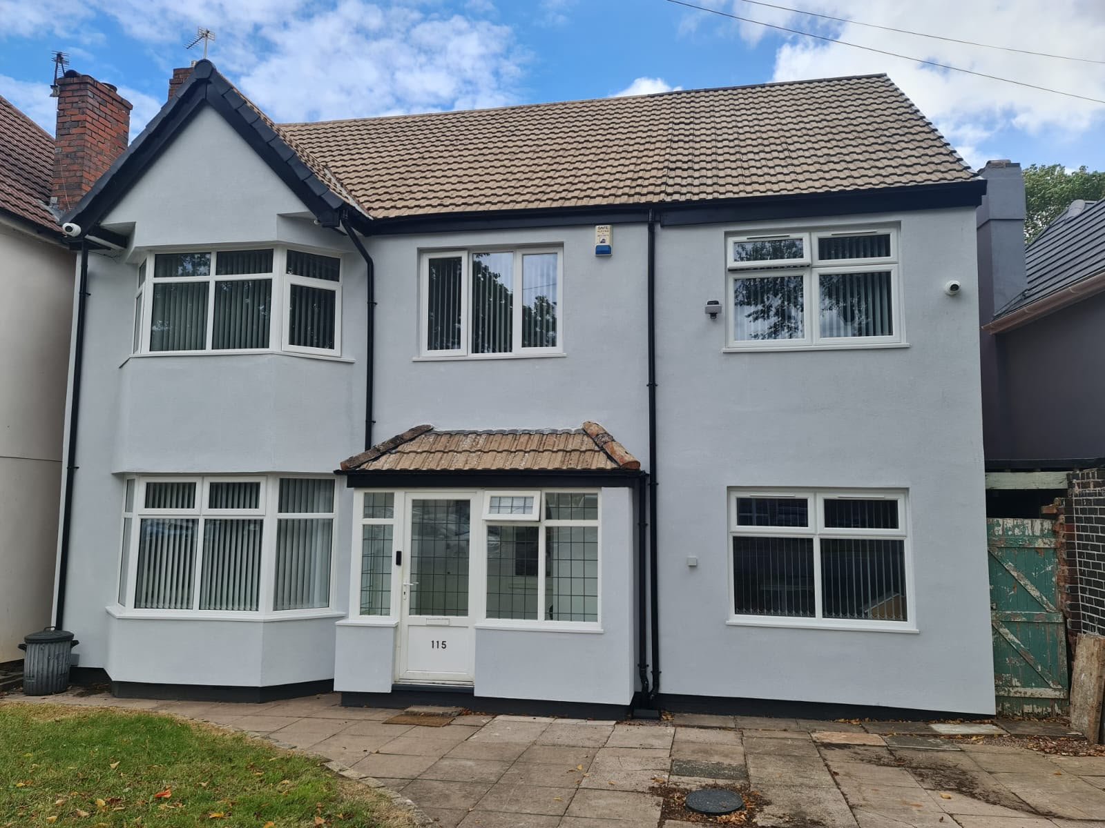 Front elevation finished in light grey silicone render over 50 mm external wall insulation in Kings Heath, Birmingham